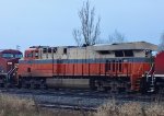 NS 8105, Interstate Heritage unit, in the #4 position of 6 locomotives, waiting for a crew in Fisher Siding with a unit stack train heading east.